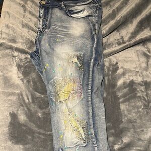 Blue Slim Distressed Jeans with Artistic Paint Splatter